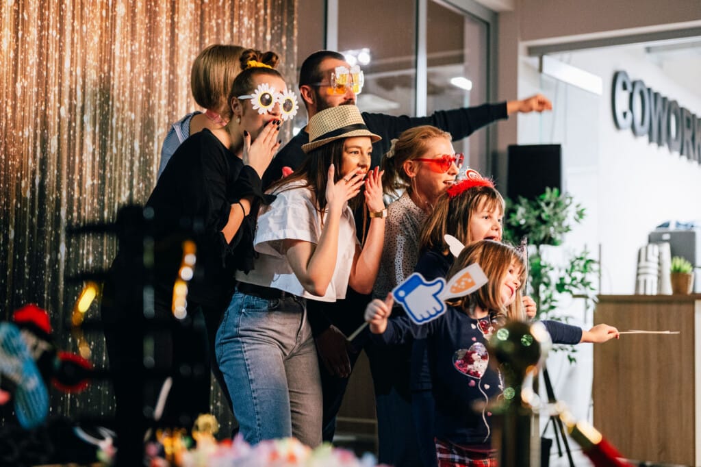 people standing in front of photo booth