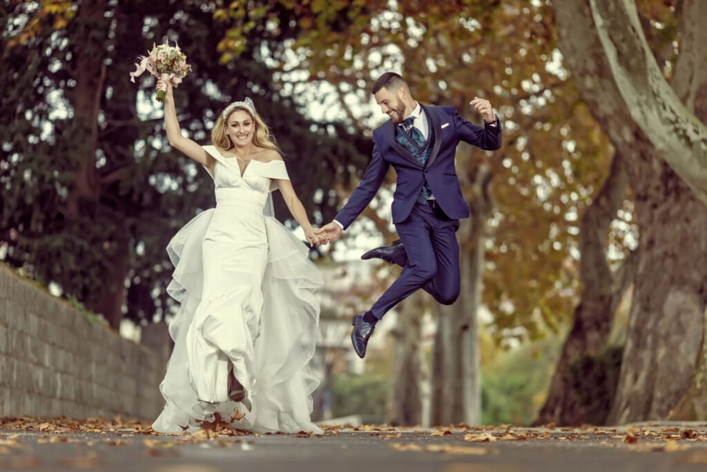 newlyweds jumping