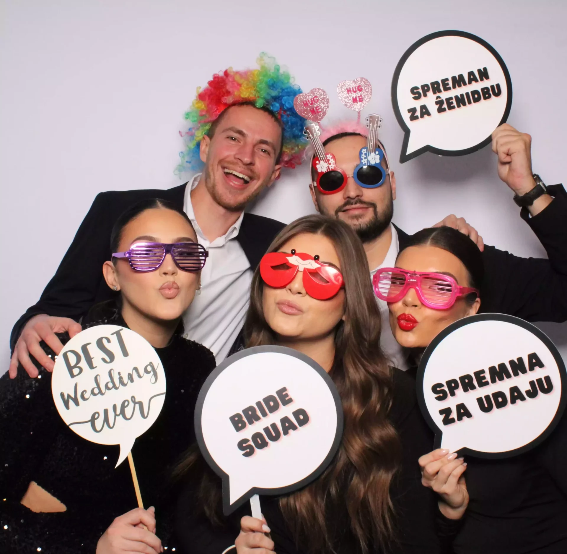 people in front of photo booth