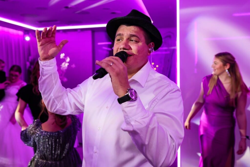 motiv band singer with hat